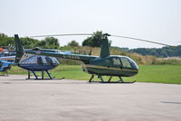 G-RAVN @ EGTB - Robinson R44 Raven at Wycombe Air Park - by moxy