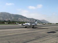 N1VK @ SZP - 1960 Beech B95 TRAVEL AIR, two Lycoming O&VO-360s 180 Hp each, taxi back after landing Rwy 22 - by Doug Robertson