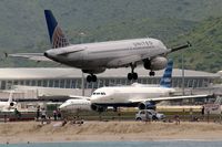 N413UA @ TNCM - N413UA