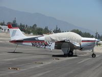 N696MC @ CCB - Covered up, chained down and parked in transient parking - by Helicopterfriend