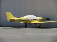 N320DE @ CNO - Covered up and parked next to a hanger - by Helicopterfriend