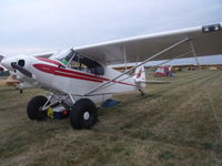 N1554P @ OSH - piper super cub with tundra tires - by christian maurer