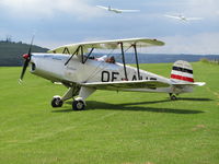OE-AHS - Bücker Jungmann on Airstrip (Flugplatz Schameder - Wittgenstein) after a short stop / Background gliders - by Karl-Heinrich Radenbach