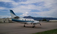 N699KM @ KBDU - Back drop is the Boulder Flatirons - by James P.