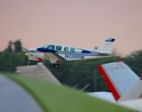 N136RM @ KOSH - Departing EAA Airventure/Oshkosh on 24 July 2012. - by Glenn Beltz