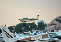 N7218R @ KOSH - Departing EAA Airventure/Oshkosh on 24 July 2012.