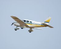 N8235S @ KOSH - Departing EAA Airventure/Oshkosh on 25 July 2012. - by Glenn Beltz