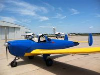 N99055 @ KVPZ - At VPZ with Air Force 2 in the background - by John Ginley