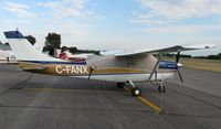 C-FANX @ KAXN - Cessna 210B Centurion on the line. - by Kreg Anderson