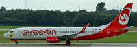 D-ABMG @ EDDL - Air Berlin (BVB - Real Love and Doublewinner 2012 sticker for the german football team Borussia Dortmund), seen here speeding up on RWY 23L at Düsseldorf Int´l (EDDL) - by A. Gendorf