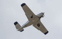 N24131 @ KAMA - While snapping some shots of a KC-135R in the pattern, this little guy pops up overhead almost before I even realized he was there. - by IndyOST