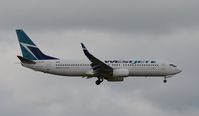 C-GJWS @ CYOW - Landing on rwy 32. - by Dirk Fierens