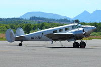 N70WW @ AST - 1945 Beech D18S, c/n: A-38 at Astoria - by Terry Fletcher