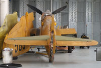 SE-BRG @ EGSU - stored in No 3 Hangar at Duxford - by Chris Hall