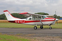 G-AYCJ @ EGBR - Cessna TP206D Super Skylane at The Real Aeroplane Club's Summer Madness Fly-In, Breighton Airfield, August 2012. - by Malcolm Clarke
