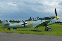 G-BWUE @ EGSU - The Buchon is essentially a Rolls-Royce Merlin-engined Messerschmitt Bf109, This aircraft was one of 27 purchased at auction from the Spanish Air Force by Spitfire Productions for use in the making of the 1968 film “Battle of Britain”. - by Chris Hall