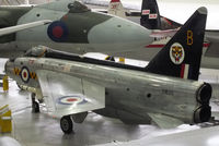 XM135 @ EGSU - In 74 'Tiger' squadron colours displayed inside the AirSpace hangar, Duxford - by Chris Hall