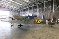 G-AIST @ EGSU - Painted in 57 OTU colours, and coded JZ-E. This colour scheme represents AR213 as personal aircraft of Flight Lieutenant James Harry 'Ginger' Lacey while he was posted as an instructor pilot - by Chris Hall