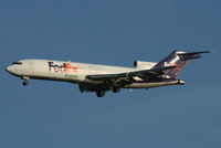 N213FE @ KBOS - Early morning arrival at Boston Logan International Airport - by Rich Barnett