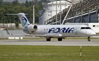 S5-AAJ @ EDDM - departure from Munich - by Friedrich Becker