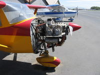 N5804E @ SZP - 1959 Cessna 150, Continental O-200-A 100 Hp, engine cowls off. All C150 production used this same engine until the C152 commencing 1977 used a Lycoming O-235 for 100LL fuel. - by Doug Robertson