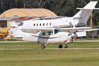 N732BB @ DPA - FREELANCE AIR Cessna T210L, TWY W for a RWY 2L departure to Oakland County International/KPTK. - by Mark Kalfas