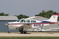 N928LB @ KOSH - Beech F33A