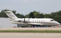 XA-GUA @ KOSH - Challenger 601 - by Mark Pasqualino