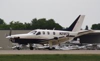 N218TG @ KOSH - Socata TBM 700 - by Mark Pasqualino