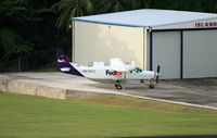 N878FE @ TLPC - A FedEx (Mountain Air Cargo) Cessna Super Cargomaster awaits its next shipment of parcels to Florida or another Caribbean destination. - by Daniel L. Berek