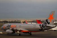 VH-VGR @ YSSY - Jetstar Airbus A320 - by Thomas Ranner