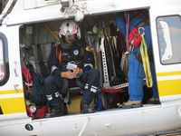 N120LA @ POC - Harness on, safety strapped to the ship, camera on helmet ready, waiting for lift off for a possible hoisting rescue - by Helicopterfriend
