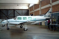 ZS-NPG @ FAGM - Piper PA-31-325 Navajo C/R [31-7912092] Rand~ZS 07/10/2003 - by Ray Barber