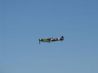N1940K @ CMA - 2003 Deford Mk.IX JURCA MJ-100 full size wooden replica Supermarine Spitfire Mk. IX, Allison 1,400 Hp, another overflight 26 - by Doug Robertson