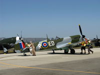 N1940K @ CMA - 2003 Deford Mk.IX JURCA MJ-100 full size wooden replica Supermarine Spitfire Mk.IX, Allison 1,400 Hp, spotting on the flight line - by Doug Robertson
