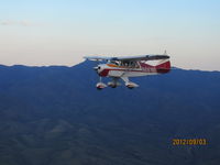 N8619D @ KFHU - Flying over the Whetstone Mountains - by Tim Timmons