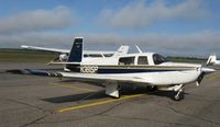 N381SP @ KAXN - Mooney M20K on the line. - by Kreg Anderson