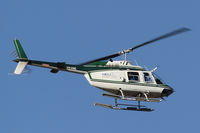 VH-VHC @ YBCS - Heli Charters Bell 206B - by Thomas Ranner
