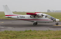 G-TERA @ EGSH - Departing a foggy SaxonAir apron.