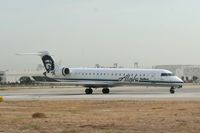 N218AG @ KLGB - Taxiing on Charlie to the gate - by Nick Taylor