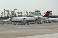 N614SK @ KLGB - Being loaded at the terminal