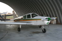 N4404T @ U76 - Parked under the round open hangar - by Nick Taylor
