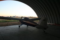 N4210T @ U76 - Parked under the round open hangar