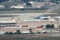 148897 @ KNTD - Parked with P-3 153443.  It is one of the oldest active C-130s in the U.S. Navy fleet. It was placed into service in October 1961 and has accrued more than 26,500 flight hours.  - by Nick Taylor