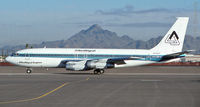 N720GT @ KPHX - Allied Signal's 720 taxiing out at PHX in Dec. 1998. - by John Meneely