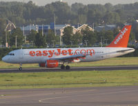 G-EZUT @ AMS - Taxi to the gate of Schiphol Airport - by Willem Göebel