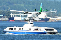 C-FWTE @ CYHC - 1968 De Havilland Canada DHC-6-100 Twin Otter, c/n: 96 landing on Coal Harbour - by Terry Fletcher