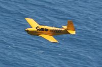 N6969U - Passing below along Malibu Beach - by Nick Taylor