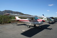 N7181F @ SZP - Parked along the river - by N.A. Taylor