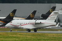 N604EM @ BFI - 2001 Bombardier CL-600-2B16, c/n: 5492 - by Terry Fletcher